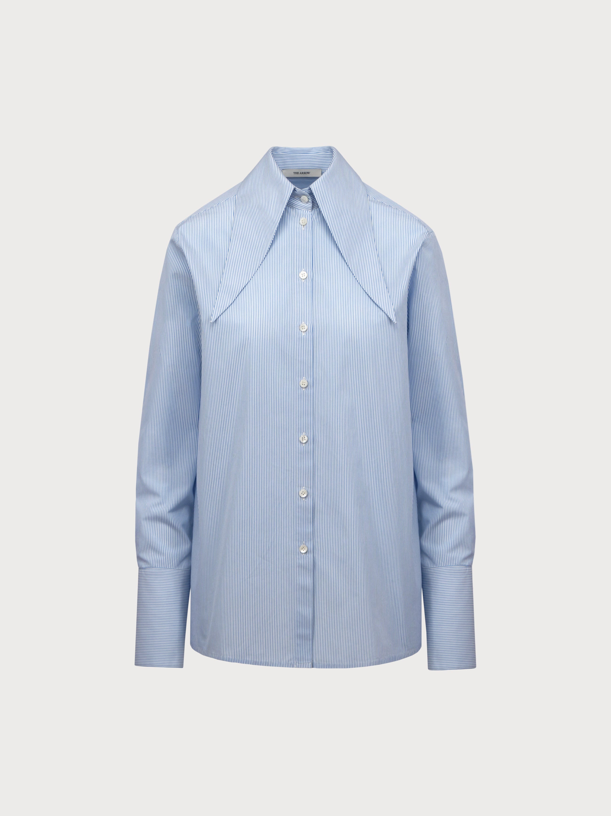 Light blue shirt on a light gray background