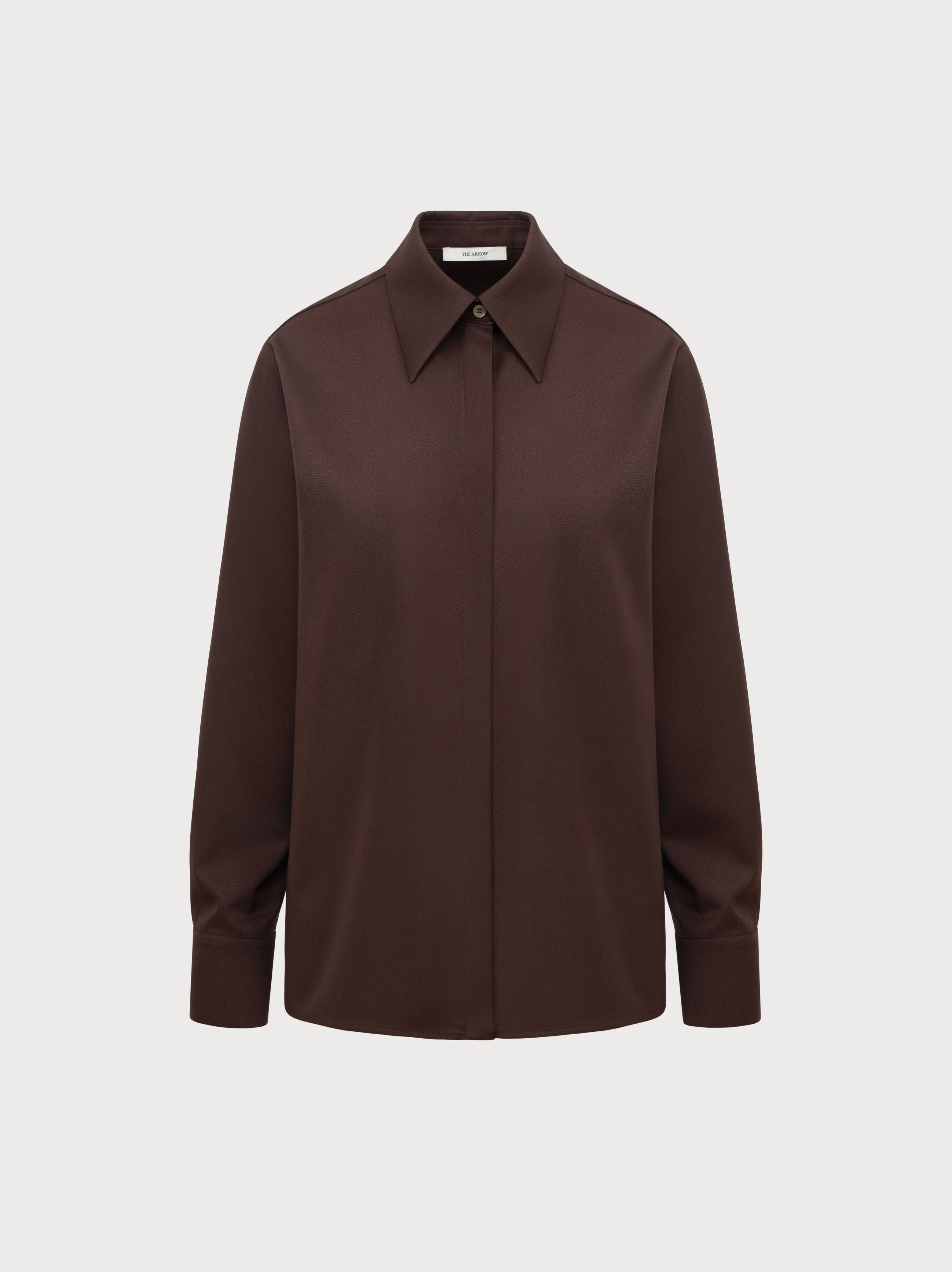 Brown shirt on a light gray background