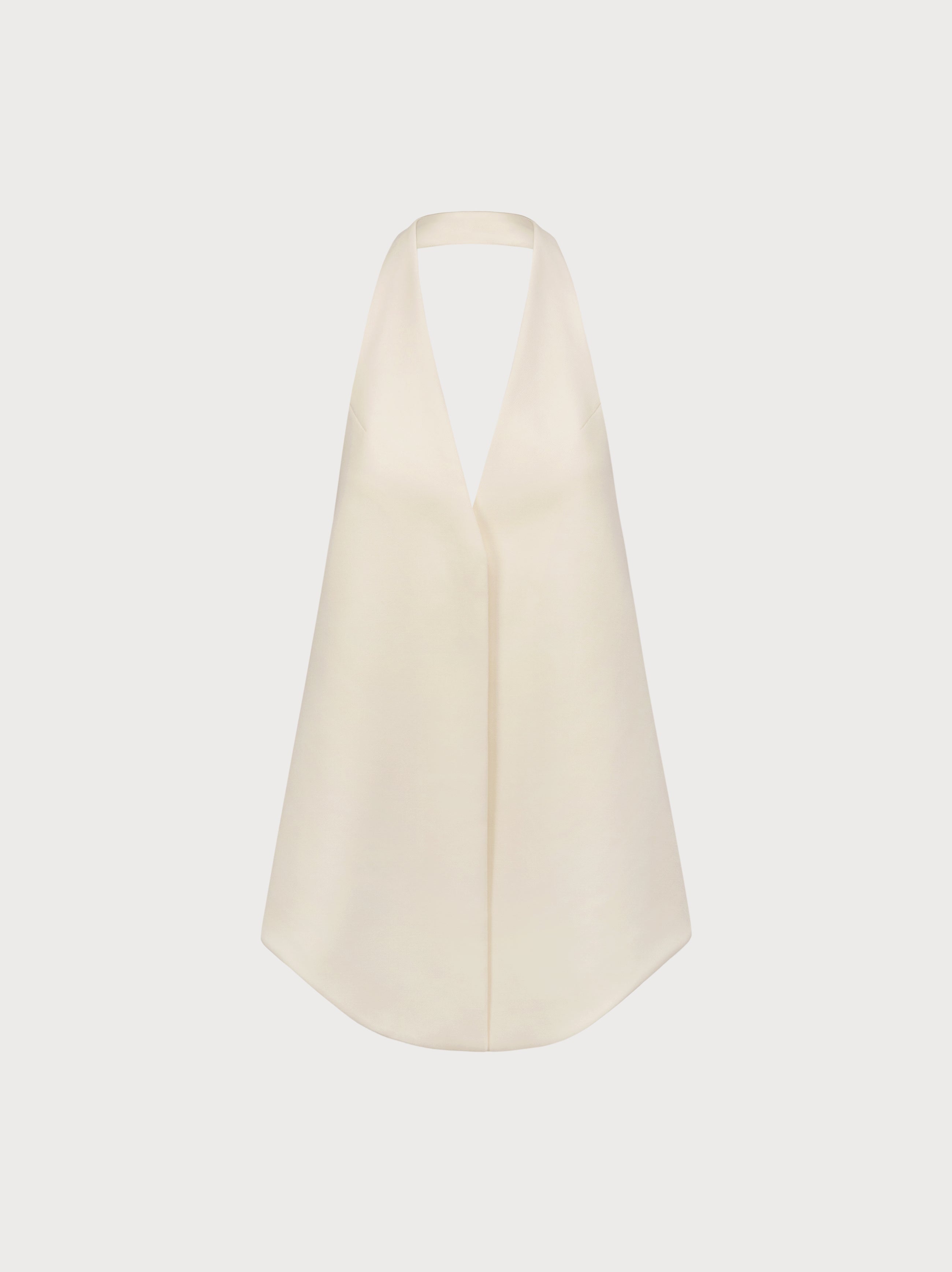 Beige halter top on a light beige background