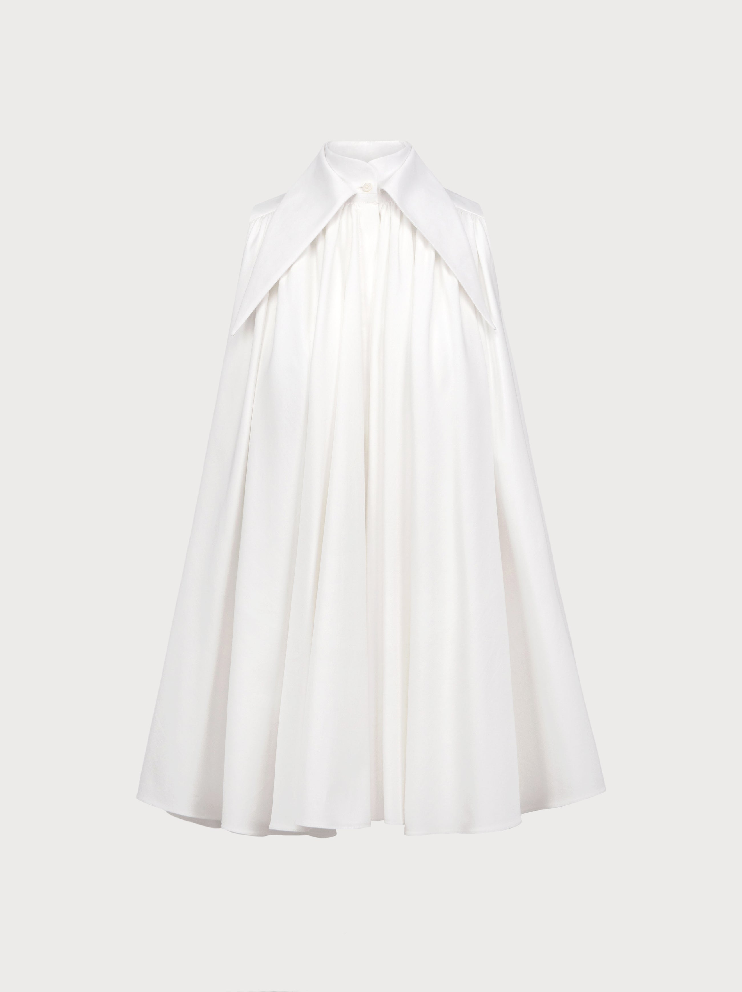 White halter neck dress on a white background