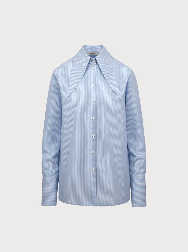 Light blue shirt on a light gray background