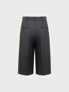 Dark gray pants on a light gray background