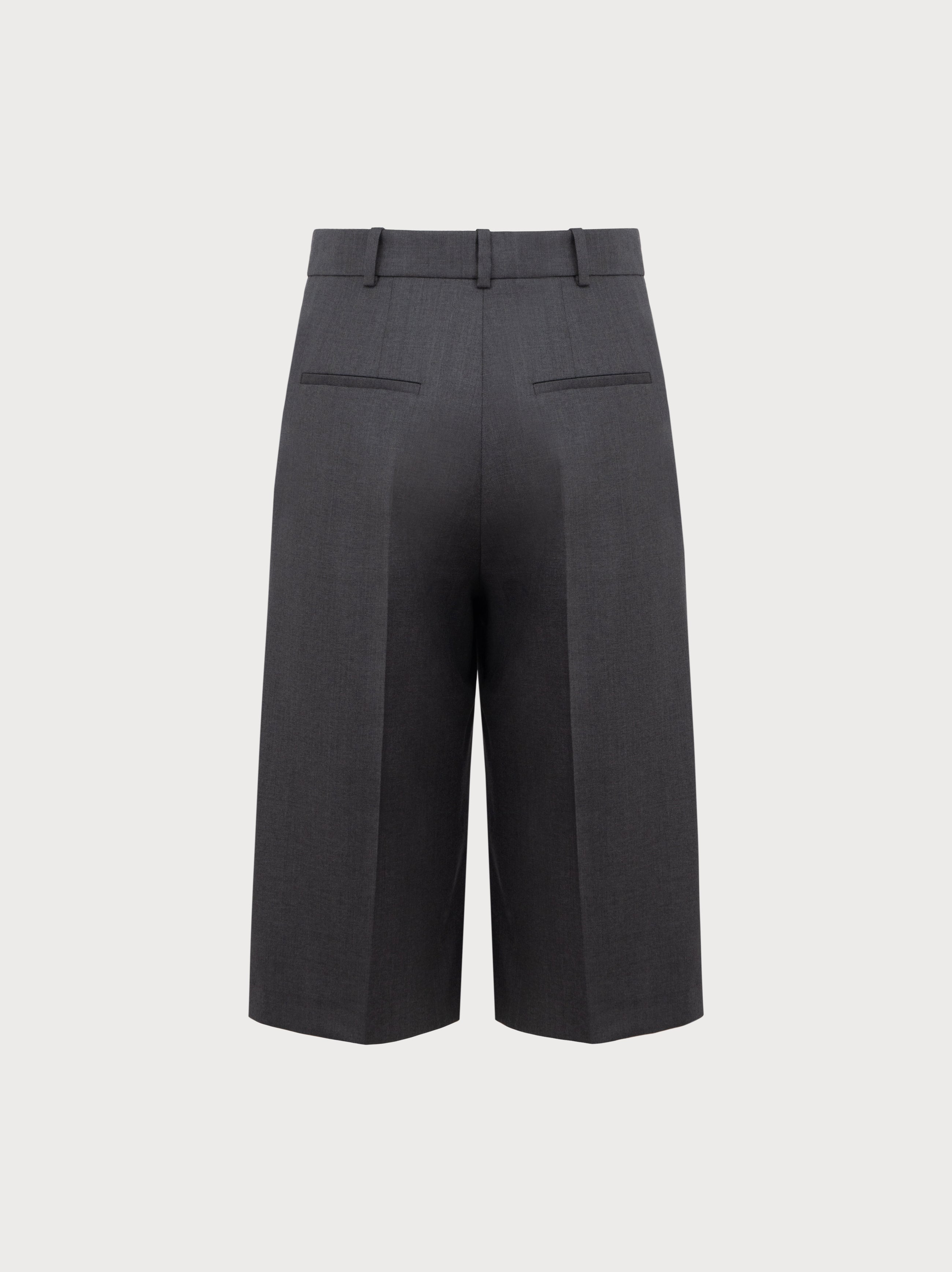 Dark gray pants on a light gray background