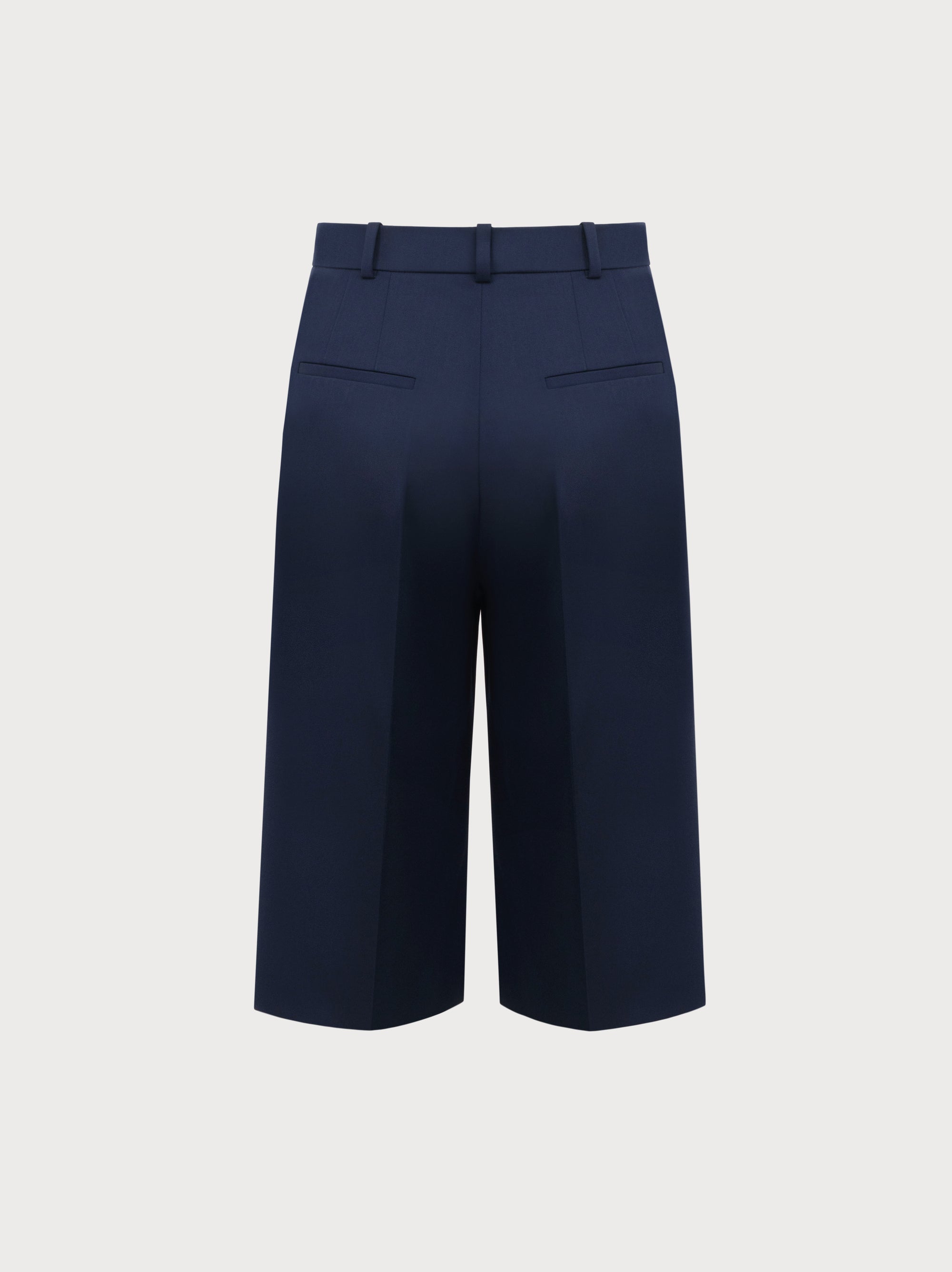 Navy blue pants on a light gray background
