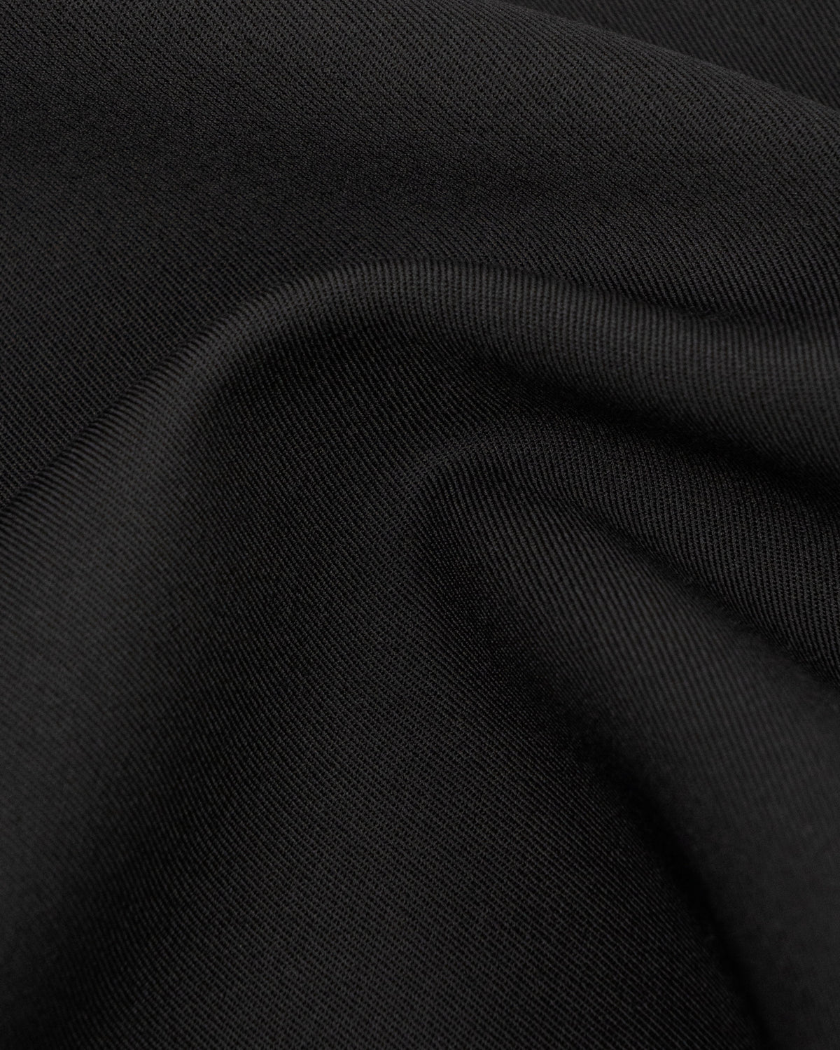 Eva Headscarf in Black Virgin Wool - fabric texture close-up