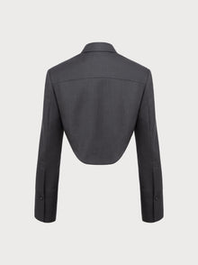 Dark gray jacket against a light gray background