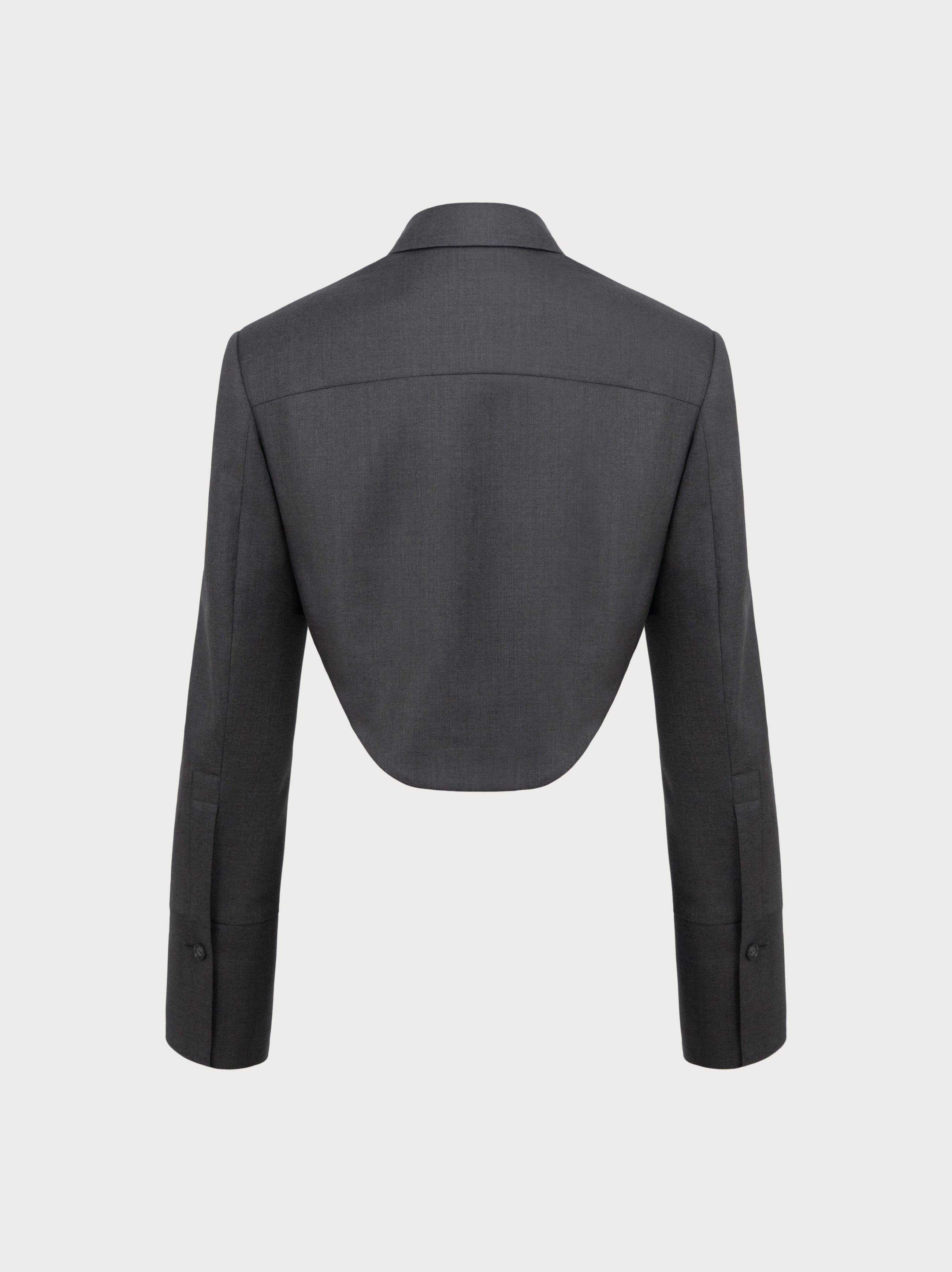 Dark gray jacket against a light gray background