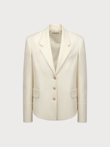 White blazer on a light gray background
