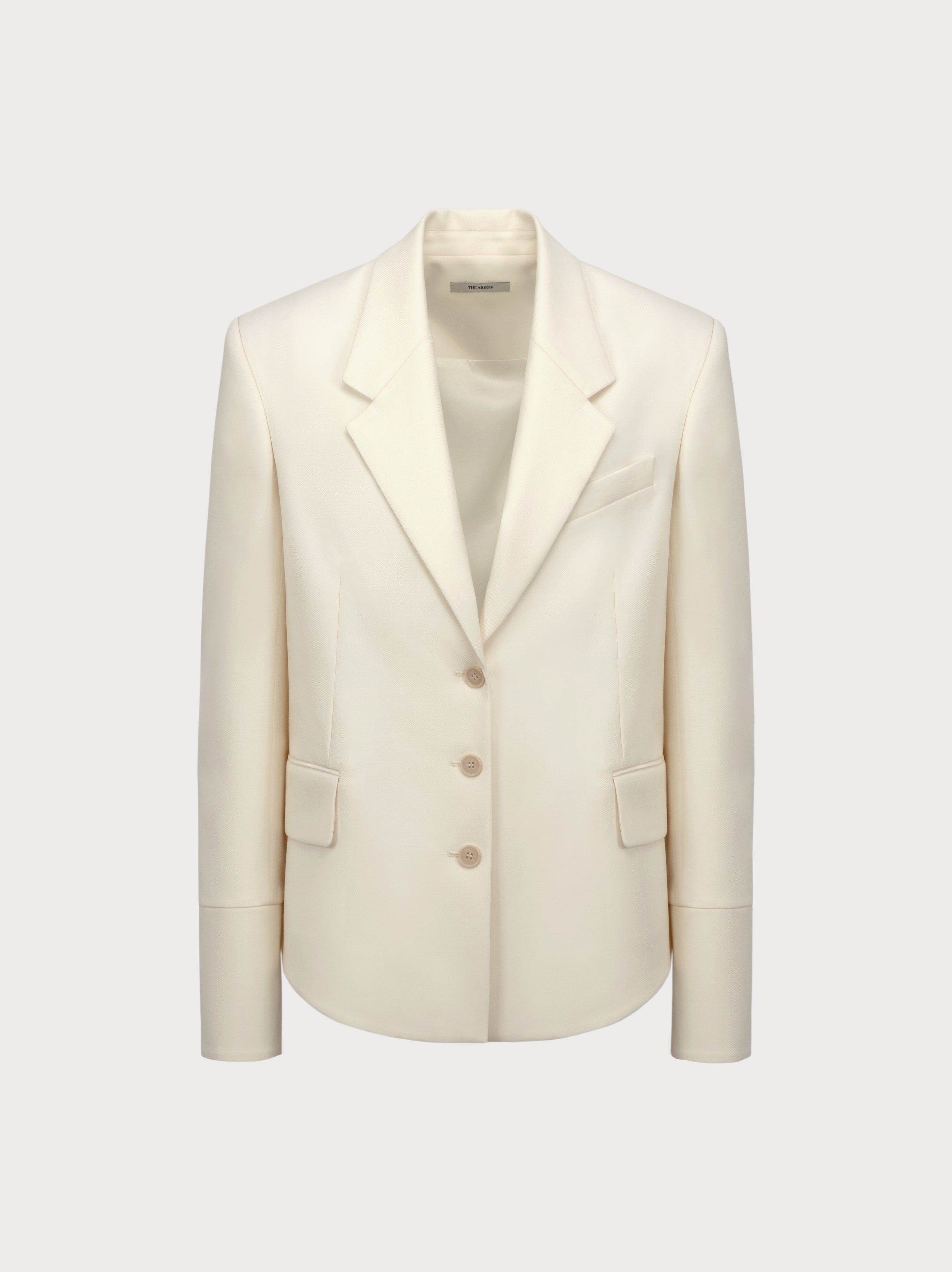 White blazer on a light gray background
