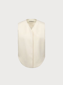 White vest with a collar on a light gray background