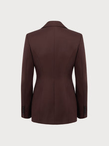 Brown blazer on a light gray background