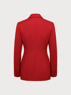 Red blazer on a light gray background