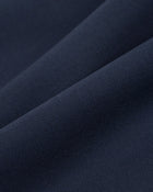 Nina Trousers in Navy Virgin Wool - fabric texture close-up