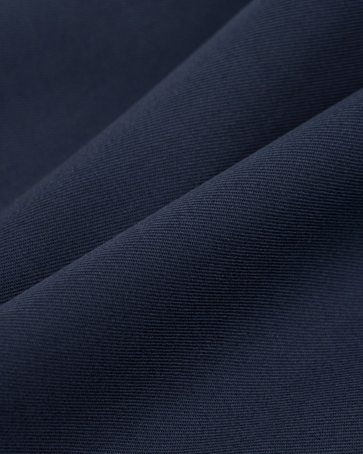 Nina Trousers in Navy Virgin Wool - fabric texture close-up