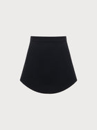 Black skirt on a light gray background