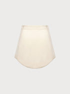 Ivory skirt on a light gray background