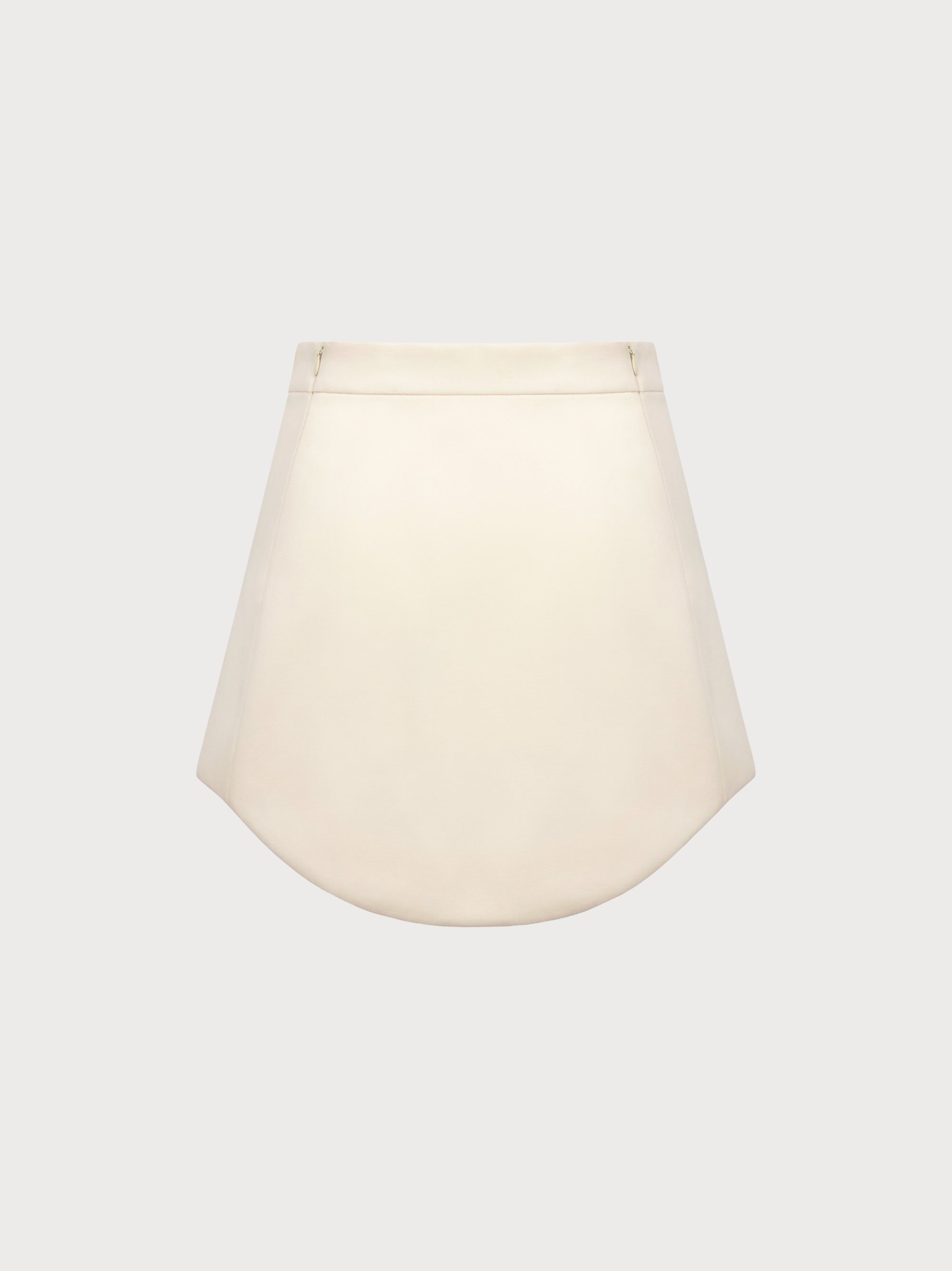 Ivory skirt on a light gray background