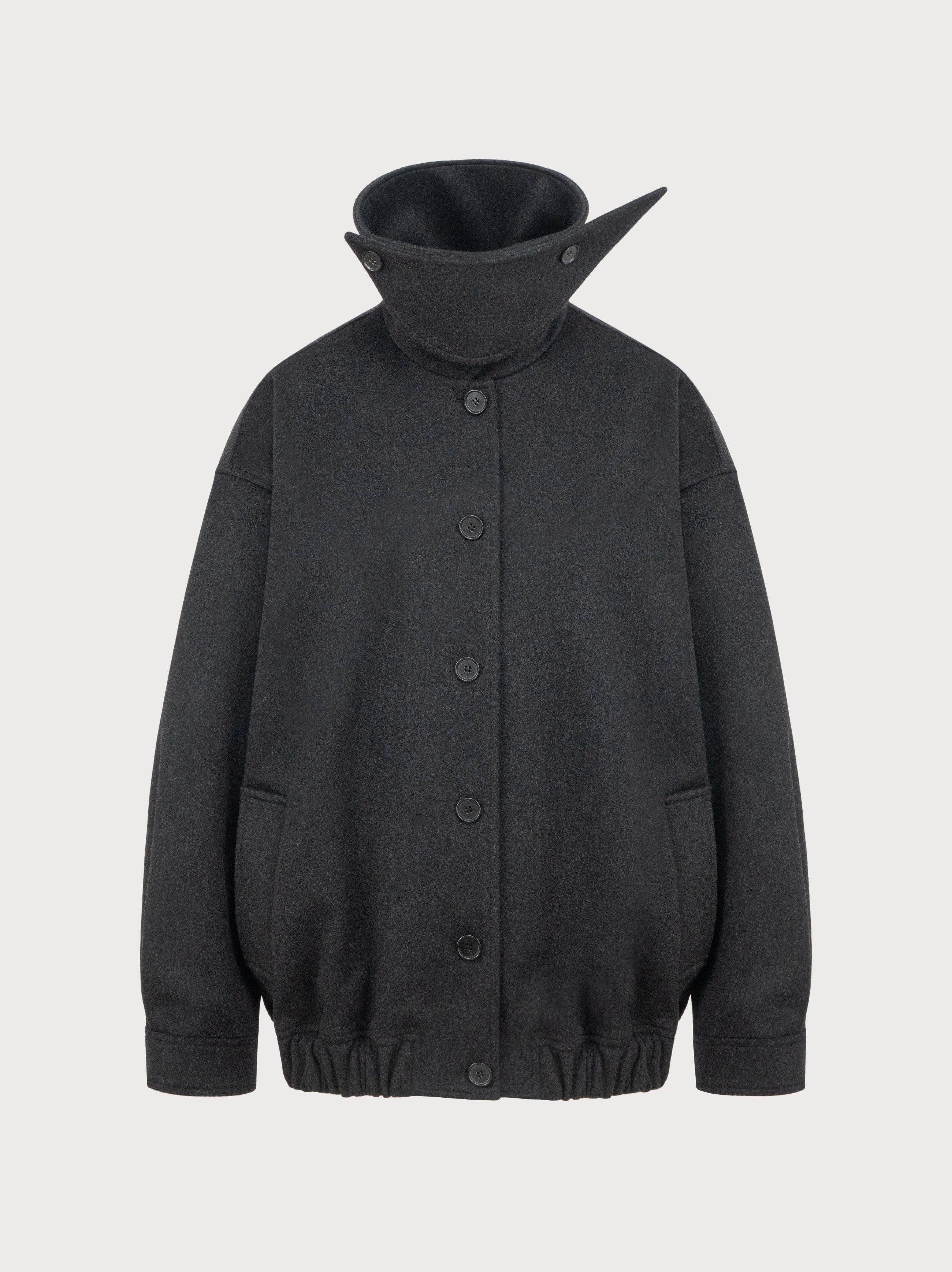 Dark gray jacket with a high collar on a light gray background