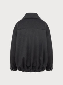 Dark grey jacket on a light gray background