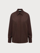 Brown shirt on a light gray background
