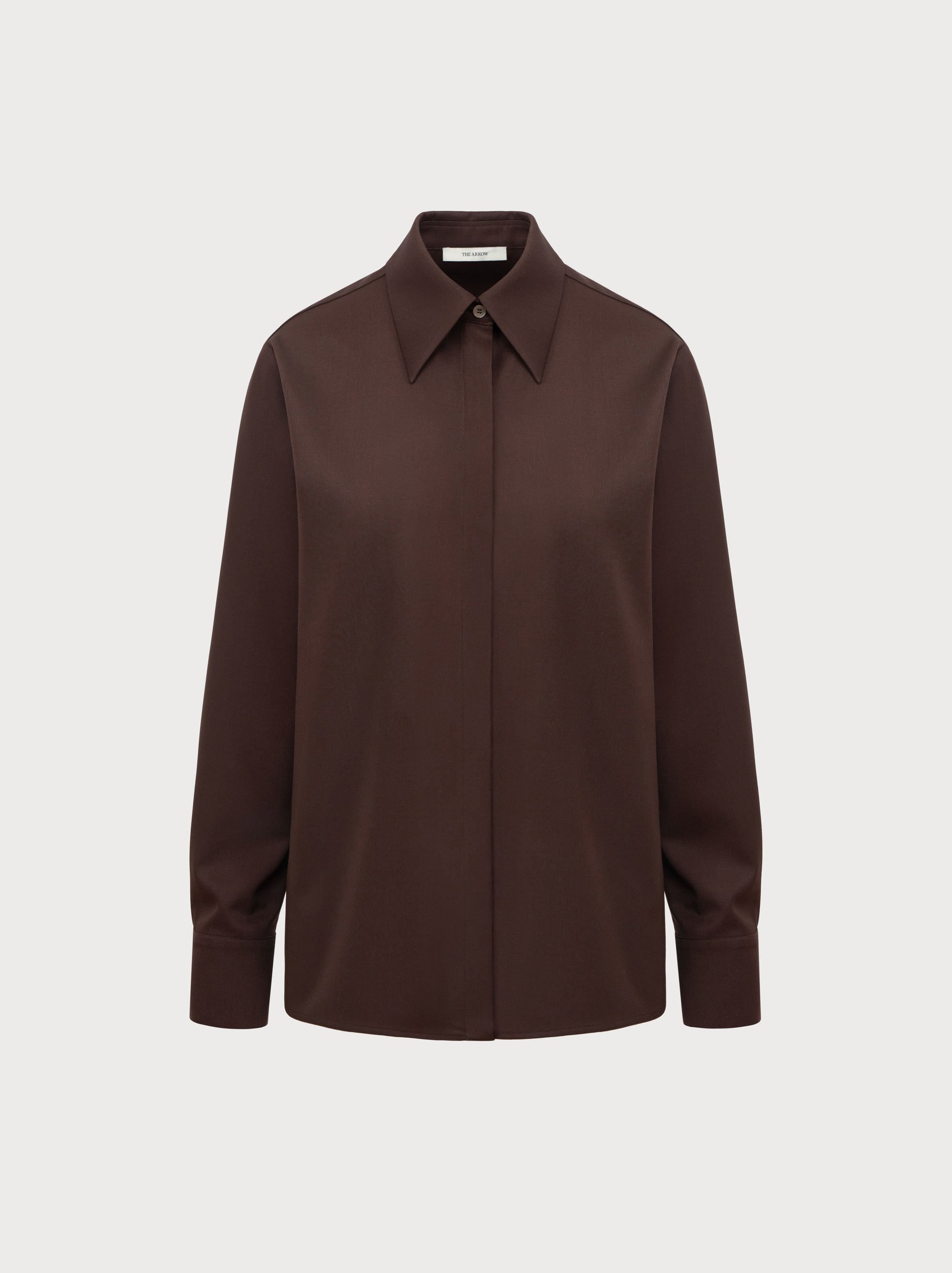 Brown shirt on a light gray background