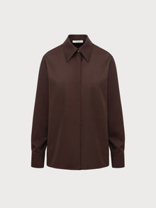 Brown shirt on a light gray background