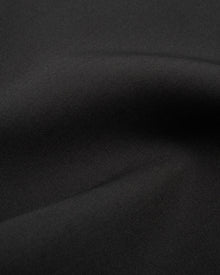 Talia Dress in Black Virgin Wool - fabric texture close-up