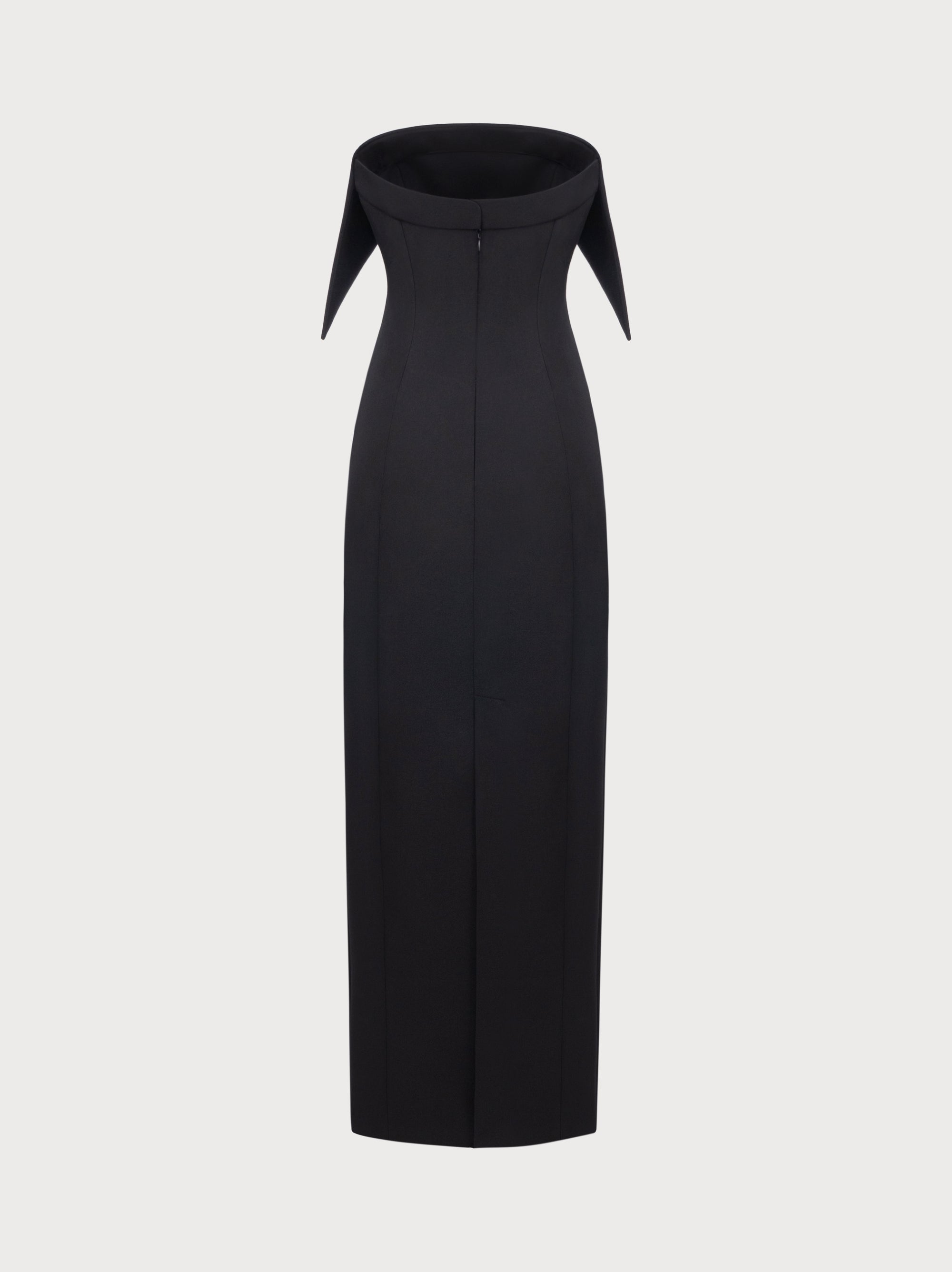 Black dress with a unique neckline on a light gray background