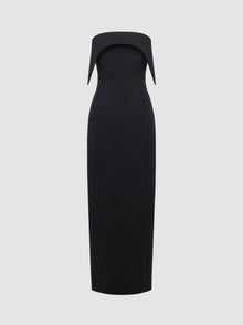 Black dress with a unique neckline on a light gray background