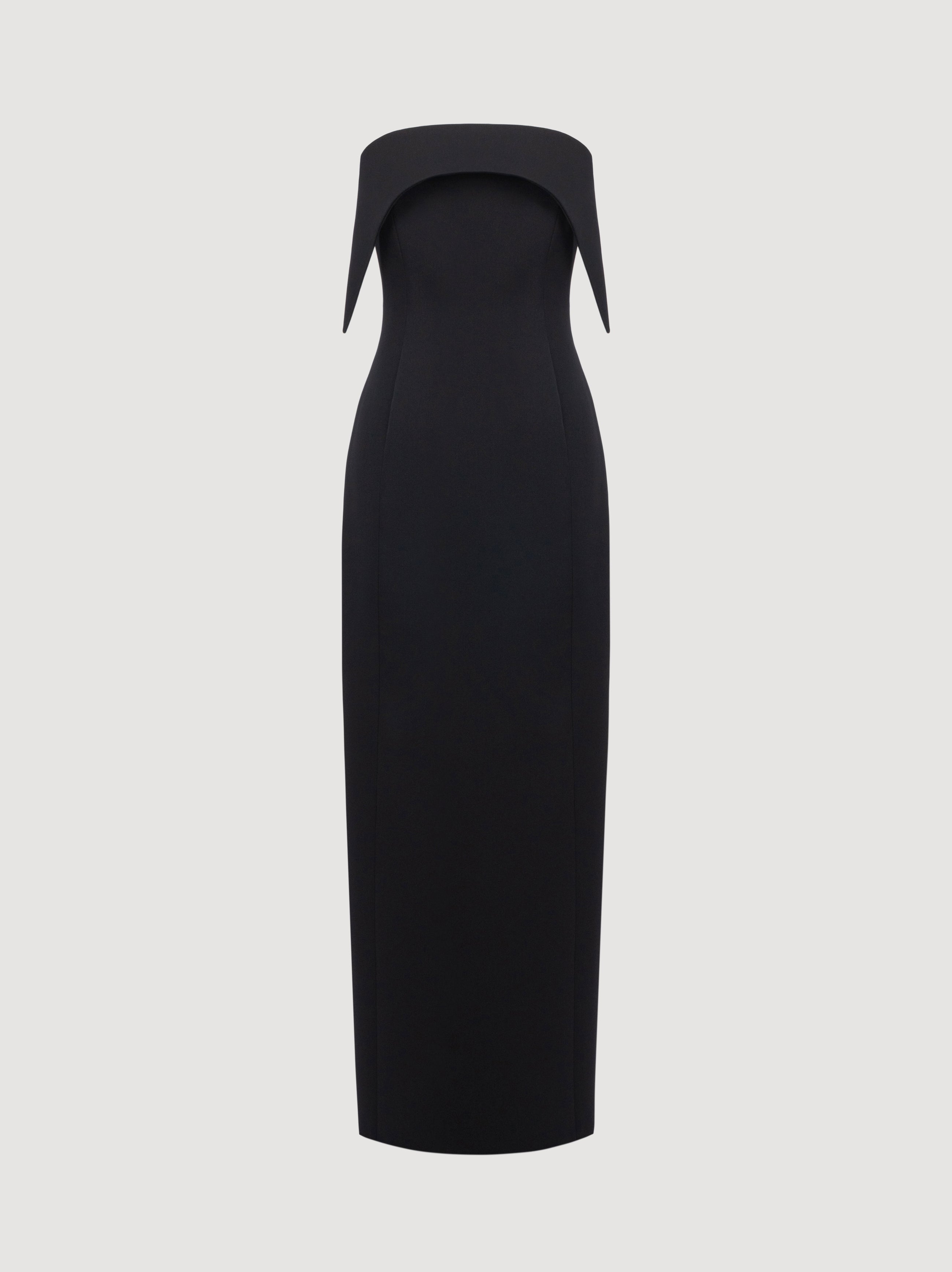 Black dress with a unique neckline on a light gray background