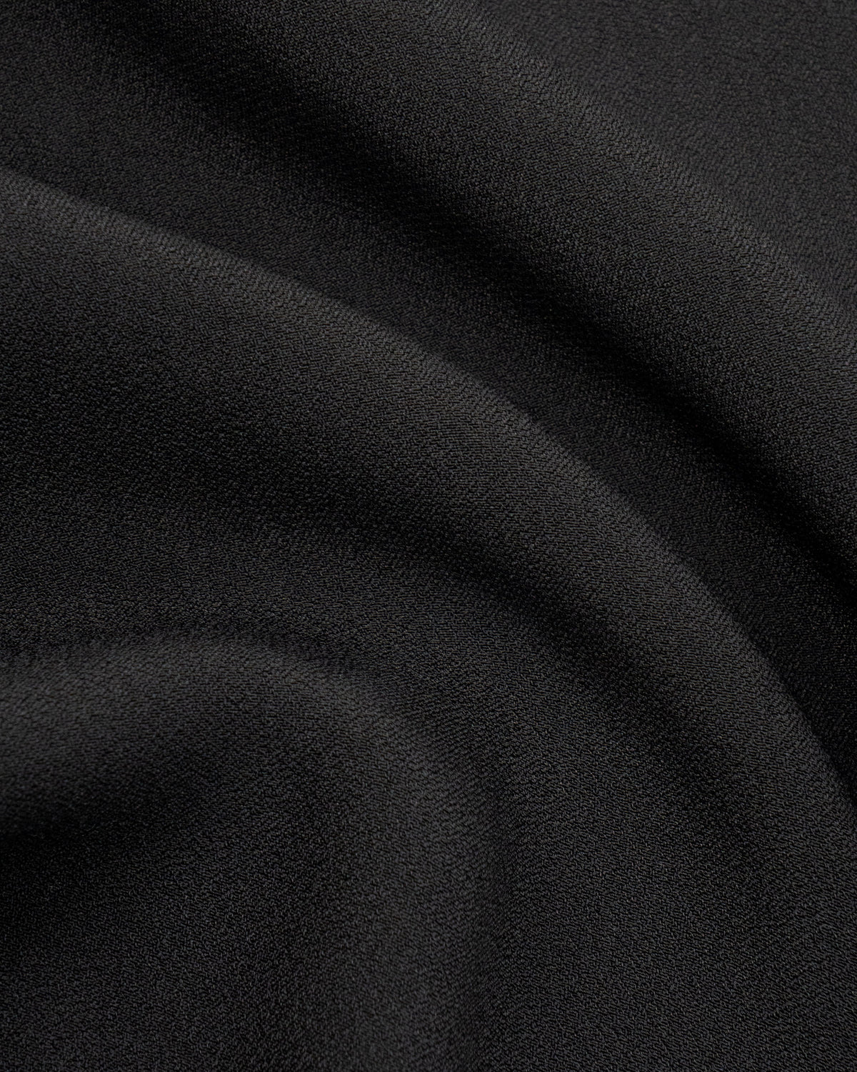 Wanda Dress in Black Crepe - fabric texture close-up