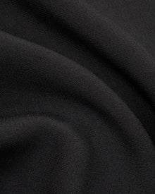 Wanda Dress in Black Crepe - fabric texture close-up