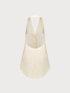 Beige halter top on a light gray background