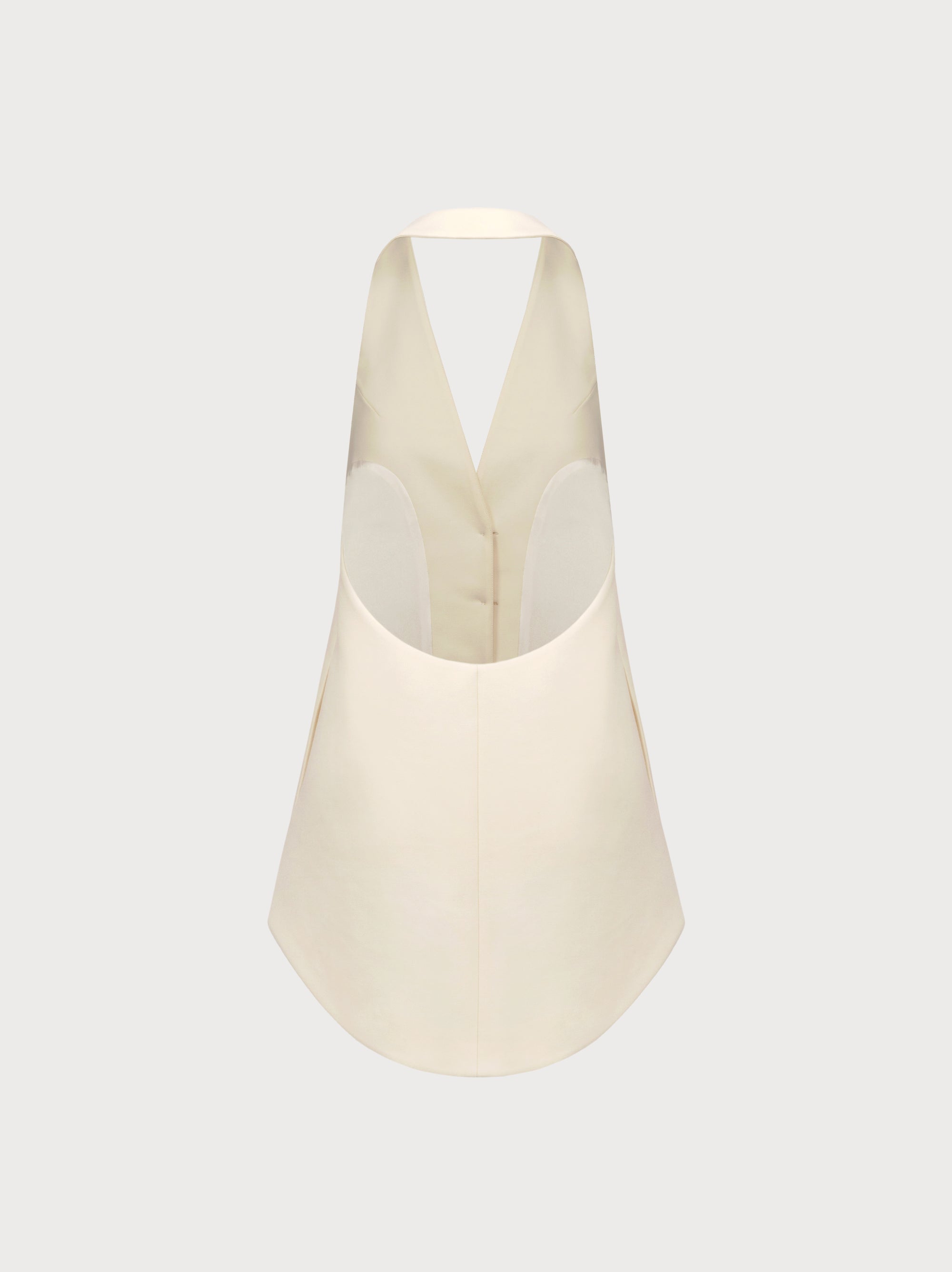 Beige halter top on a light gray background