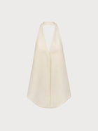 Beige halter top on a light beige background