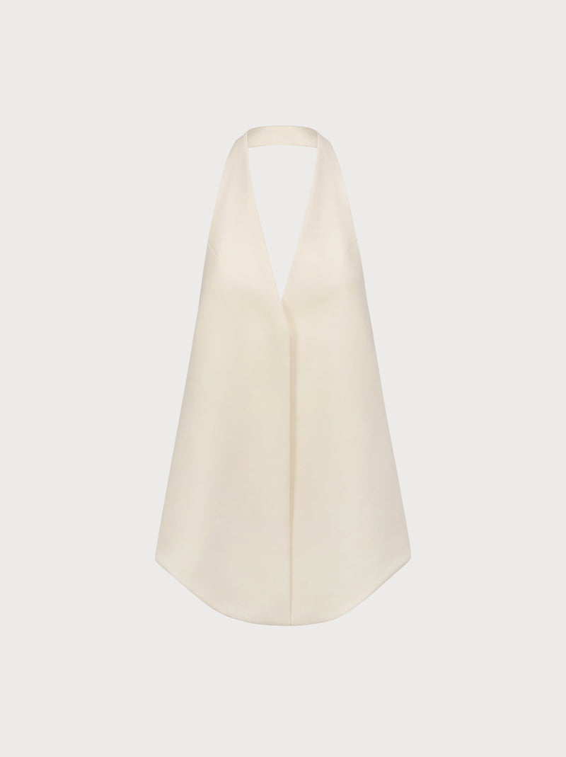 Beige halter top on a light beige background