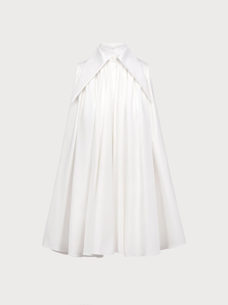 White halter neck dress on a white background