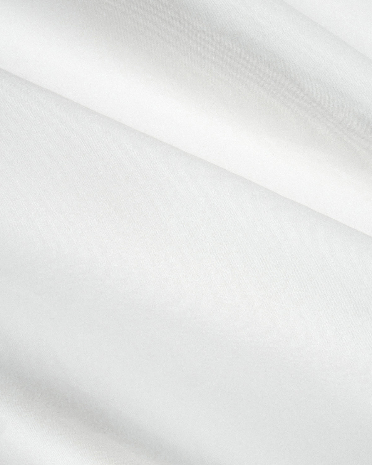 Zola Dress in White Cotton - fabric texture close-up